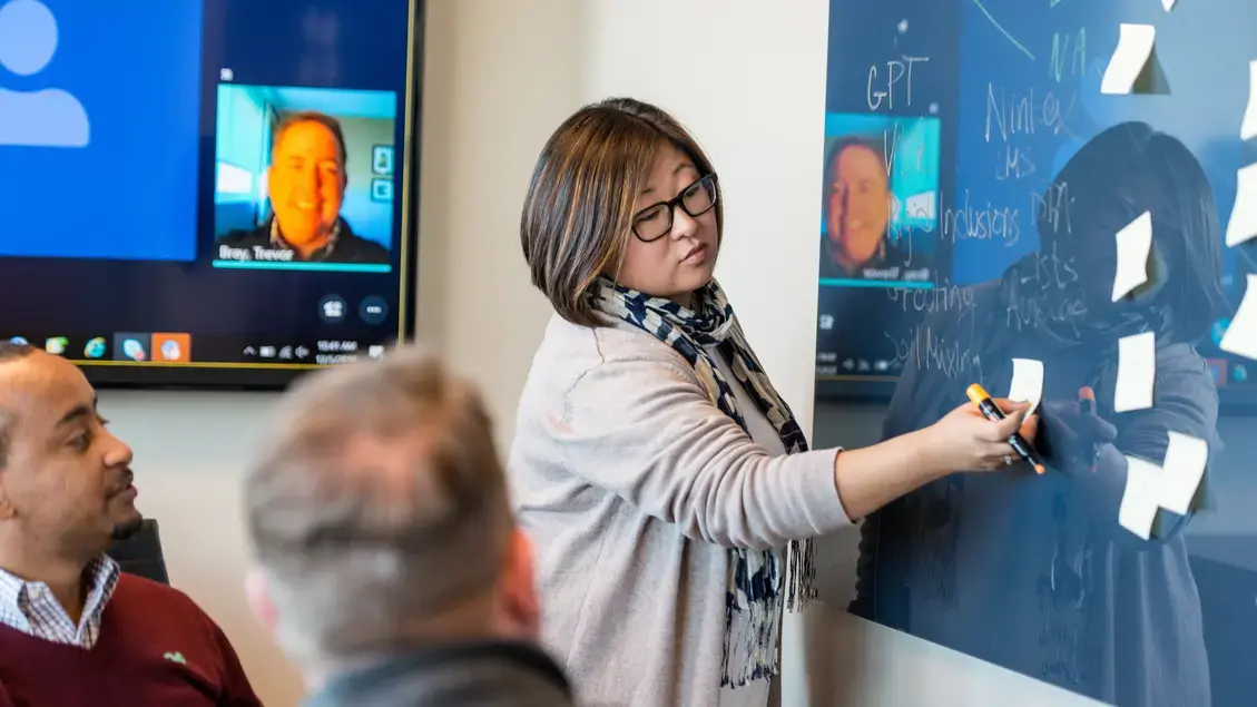 Employees from around the globe at a videoconference