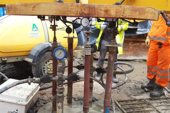 One of the base grouted columns is tested using the new extensometers alongside traditional strand anchors