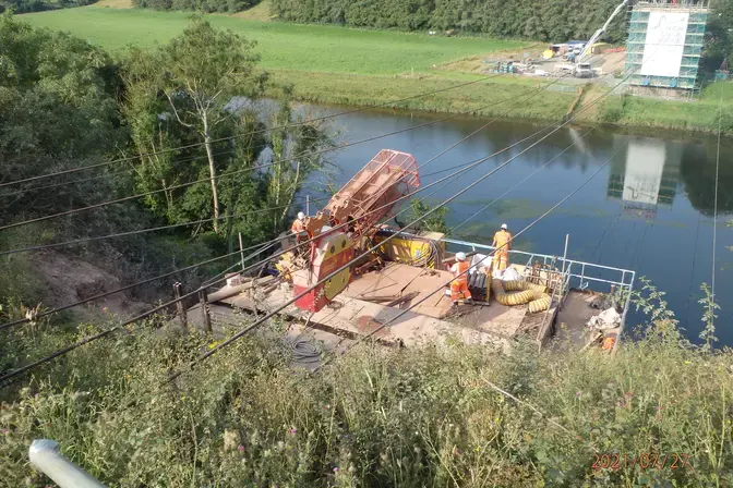 Keller working from a bespoke steel access tower on the English side of the bridge