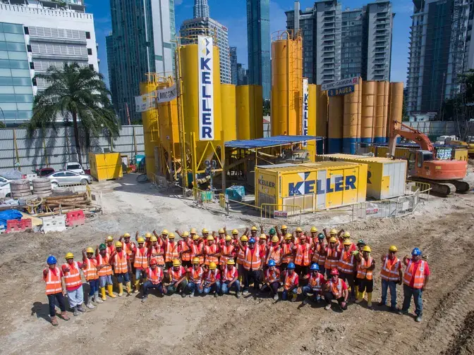 Group shot of entire Keller site team at Conlay Station project in Kuala Lumpur