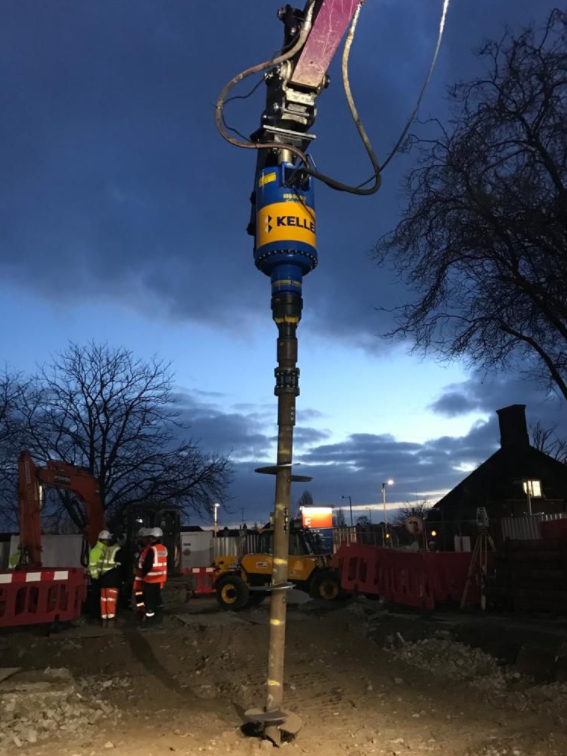 A helical pile is installed using the 100,000 Max torque head attachment