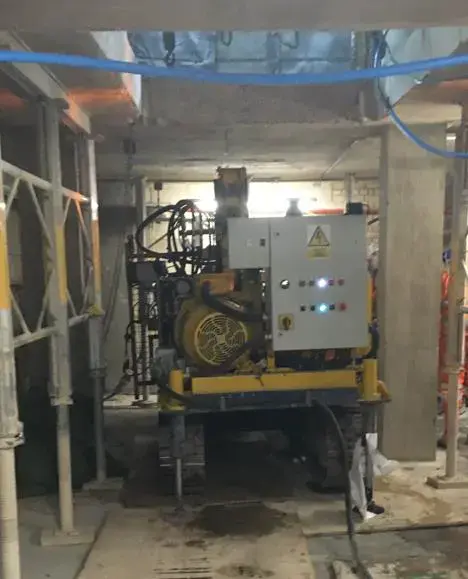 Keller's electric powered rigs installing piles in an area with very little headroom