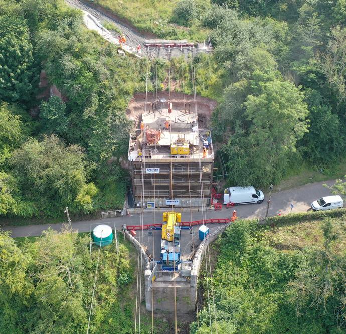 An aerial view of Keller working from the steel tower