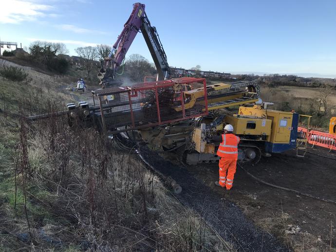 Installing the horizontal drains on the embankment