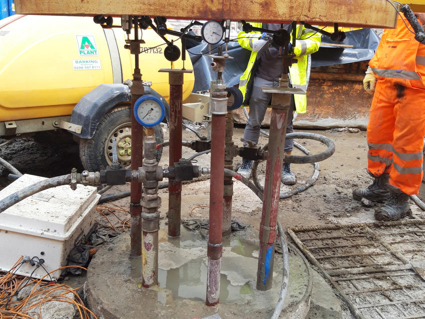One of the base grouted columns is tested using the new extensometers alongside traditional strand anchors