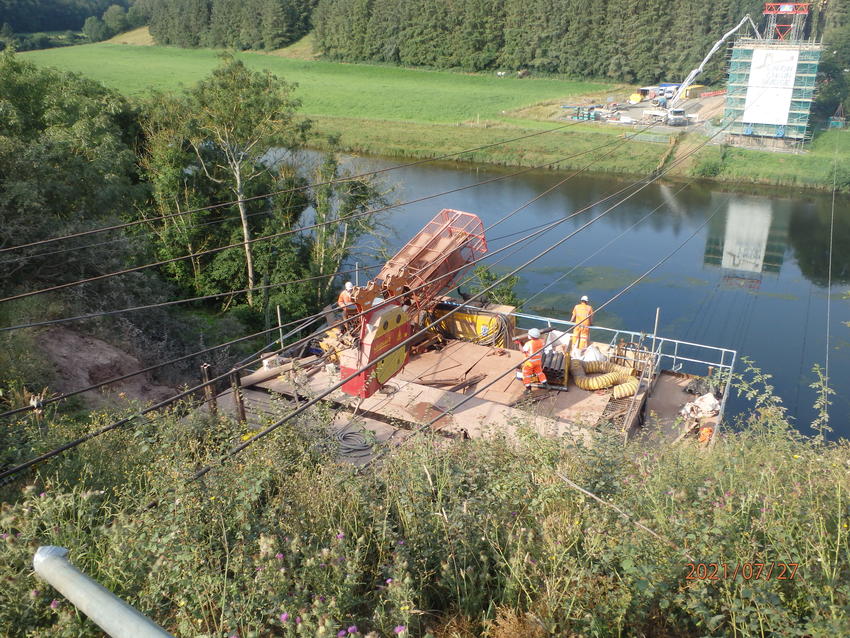 Keller working from a bespoke steel access tower on the English side of the bridge