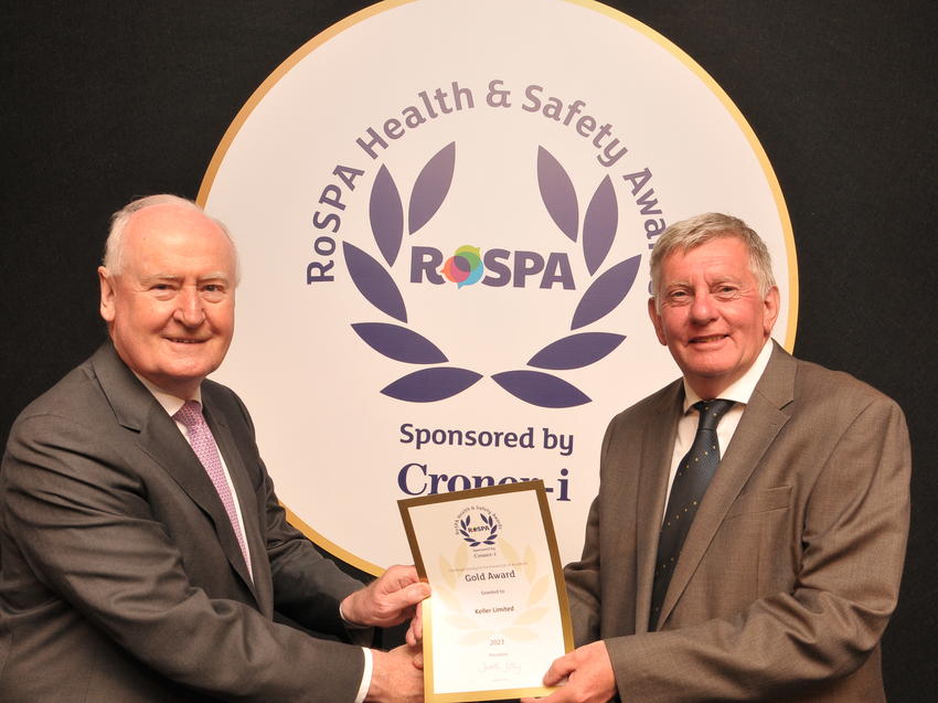 Keller HSEQ Advisor Andy Griffiths (right) receives the Gold Award certifcate from RoSPA Chairman Mike Parker