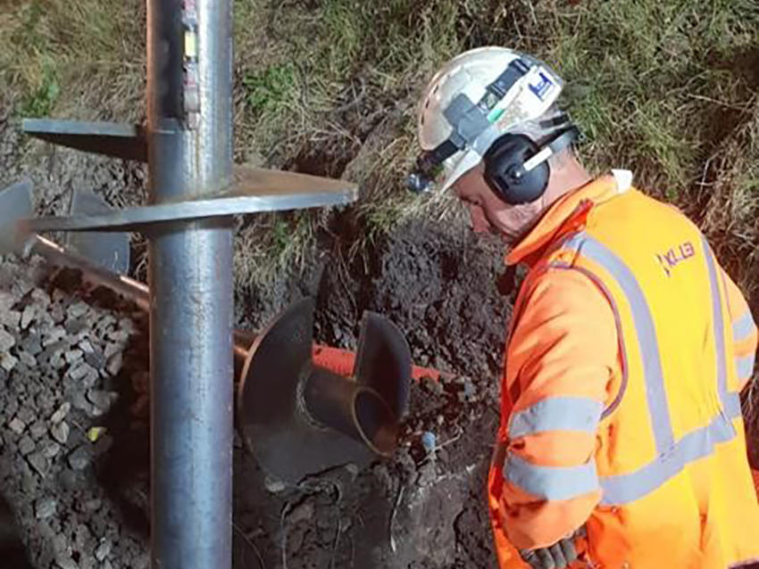 Engineer installing helical piles at Yarm station